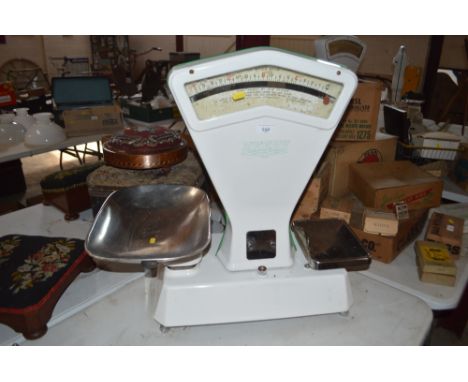 A set of Avery Vitreous enamel shop scales, stainless steel pans calibrated in ounces to money