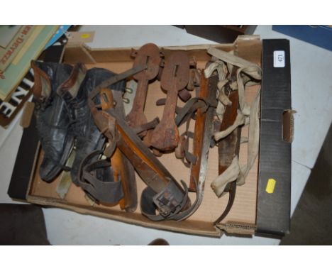 A quantity of vintage roller and ice skates 