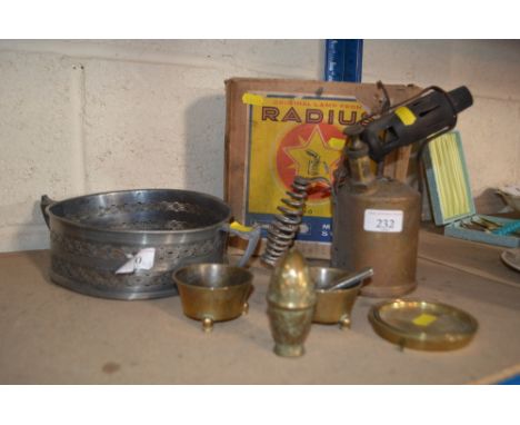 An Art Nouveau plated casserole dish holder, a pair of brass Oriental posy holders, graduated brass dishes and a blow lamp