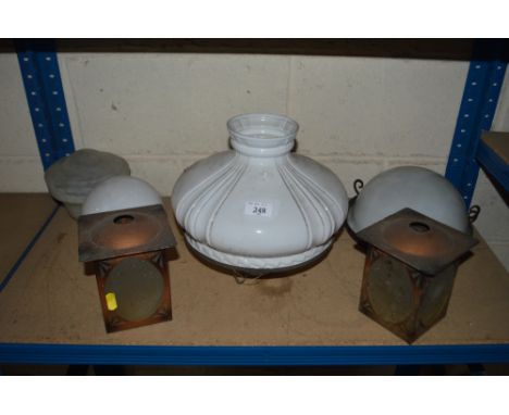 A pair of coppered Art Nouveau design porch light shades and various other opaque glass light shades