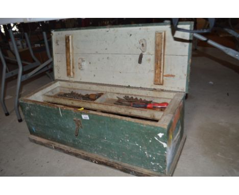 An old carpenter's toolbox and contents of various tools