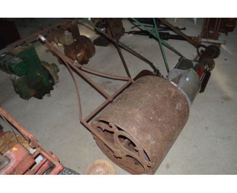 A vintage cast iron roller, AF