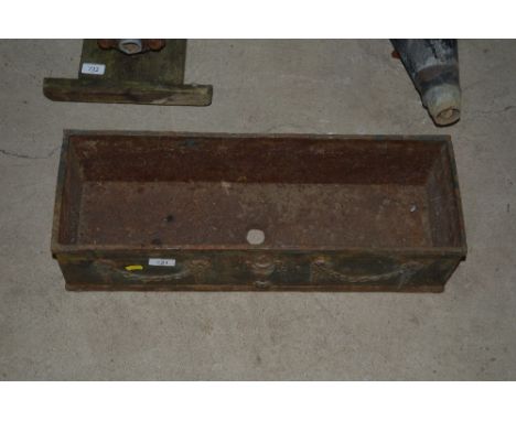 An old cast iron planter