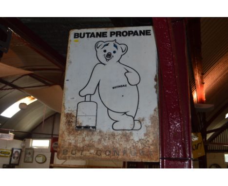 An enamel double sided advertising sign for "Butane Propane"
