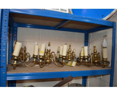 Eight twin branch brass wall light fittings