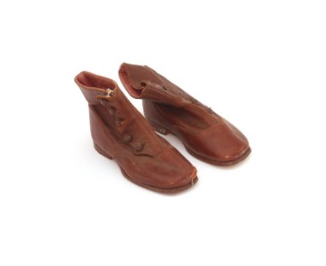 A pair of vintage child's leather boots