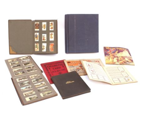 A small collection of vintage magazines and periodicals, cigarette cards and albums, stamps etc.