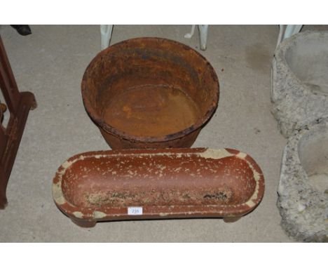 A Balding &amp; Co. of Dereham circular cast iron trough, AF and a glazed stoneware trough, AF