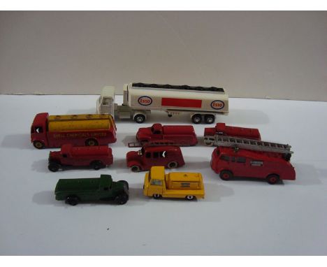 Dinky Toys fire trucks and commercial vehicles, including: an Esso AEC tanker; an A.E.C. Monarch Shell Chemical tanker; four 