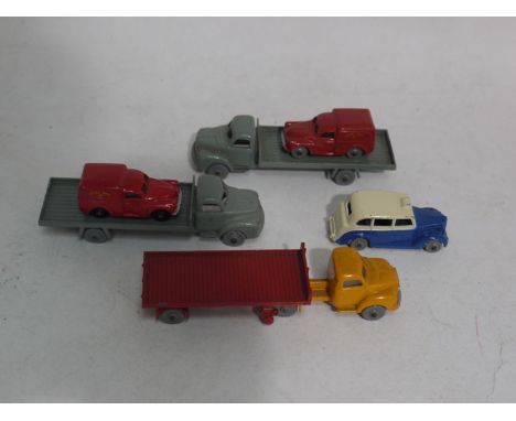 Dinky 00: two Bedford flat-back wagons, grey, two Royal Mail vans, an Austin Taxi; a tractor, and a Bedford articulated flat-