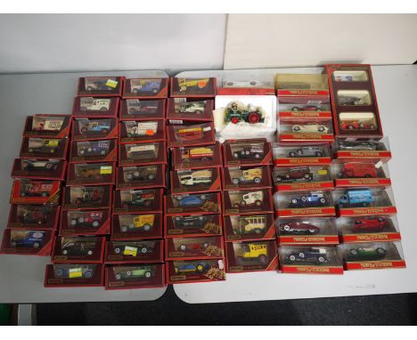 A collection of approximately fifty four boxed, Matchbox models of Yesteryear, including: a 1905 Busch self-propelled fire en