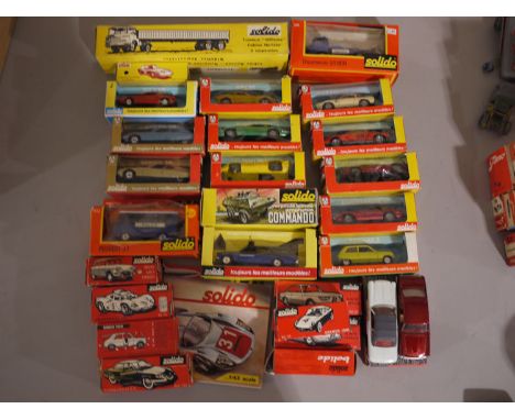 A collection of Solido die-cast model vehicles, all boxed, including: a French Market Tractaur Gillene; a Lemans Porsche; and