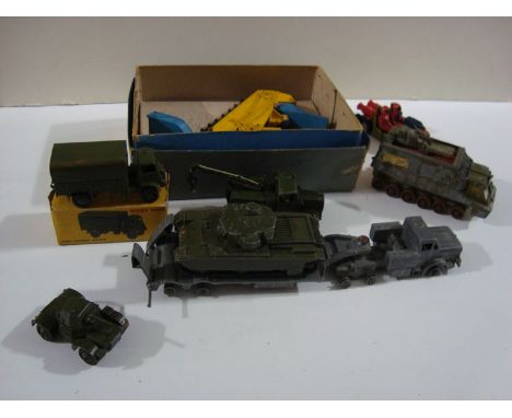 A quantity of Dinky Army vehicles and others, to include: an elevator, boxed, French, 564; a tank transporter (stripped); a t