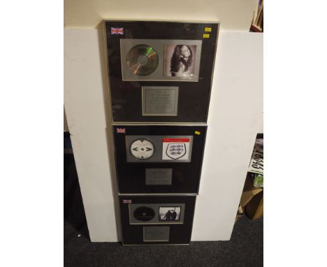 A Deacon Blue "Raintown" gold album presented to Rock Garden Glasgow; a RIAA certified reward for Honeymoon In Vegas, present
