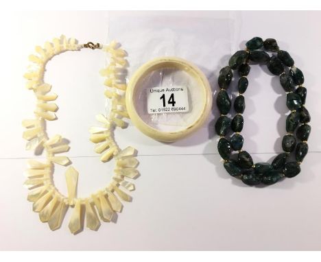 A Mother of Pearl necklace, agate necklace & ivory bangle