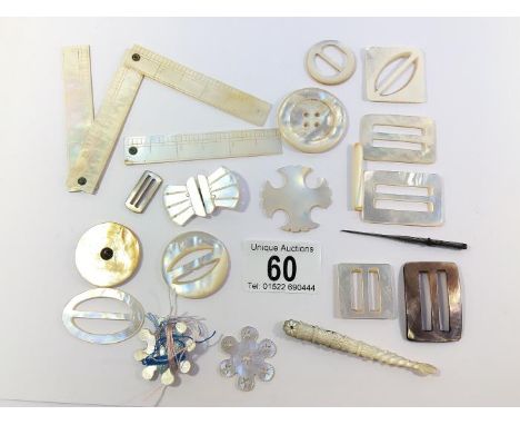A quantity of mother of pearl buckles etc