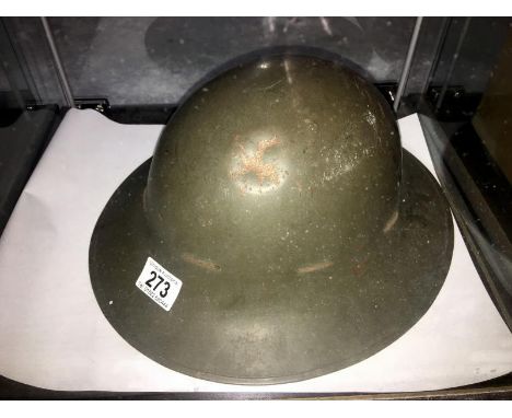 A military tin helmet