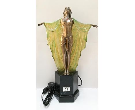 An art deco style figurine table lamp