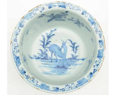An 18thC tin glazed and blue and white decorated Dutch Delftware bowl, marked G.V.S. (Het Moriaanshooft), H 16,5 - Diameter 2