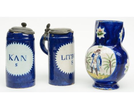 Two first half of the 19thC Brussels earthenware jugs; added a ditto late 18th - early 19thC jug with a portrait of Bonaparte