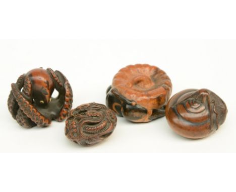 Two Japanese wooden katabori netsuke, one in the form of a pumpkin and three eggplants; the other one in the form of a vineya