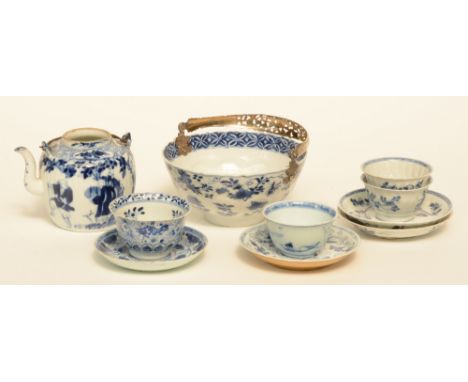 Four Chinese blue and white cups and saucers, and a dito tea pot, 18thC/19thC; added a ditto bowl, lotus relief moulded, with