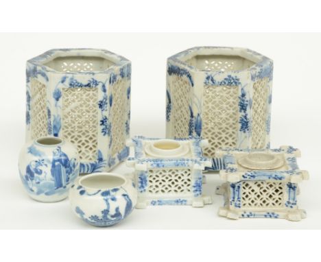 A pair of Chinese hexagonal blue and white incense burners and a pair of inkstands, with open-work decoration; added a Chines