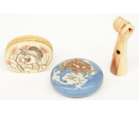 Two Japanese Manju-netsuke, one in ivory and one is porcelain; added a Meiji period ivory netsuke, H 5,5 - W 4 - Diameter 4,3