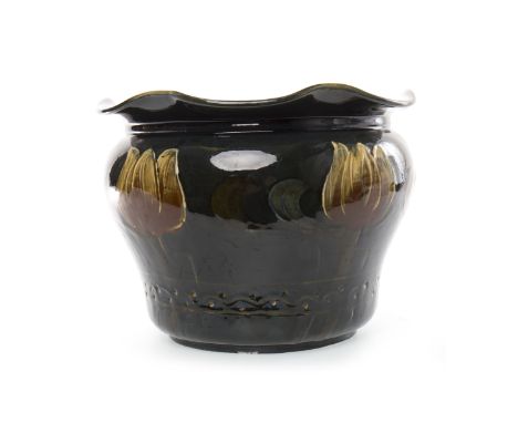 19TH CENTURY ART NOUVEAU DRESDEN PLANTER
of bulbous form with scalloped rim, tube-lined with stylized flowers on dark green g