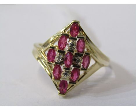 14ct RUBY &amp; DIAMOND RING, 9 well matched oval cut rubies, seperated by accent brilliant cut diamonds in 14ct yellow gold 