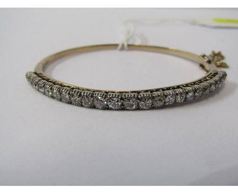 9ct YELLOW GOLD DIAMOND BANGLE, graduated brilliant cut diamonds totalling in excess of 2cts, in 9ct yellow gold hinged bangl