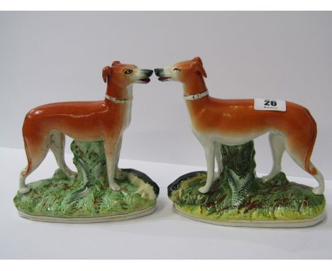 STAFFORDSHIRE POTTERY, pair of 19th Century Hunting Whippets with Game, 7" height 