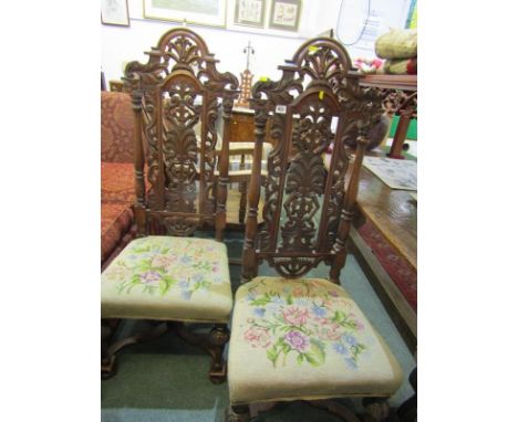 RENAISSANCE REVIVAL CHAIRS, pair of ornate carved highback chairs with floral tapestry seats and X stretchers 