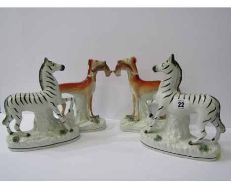 STAFFORDSHIRE POTTERY, pair of 19th Century Zebras, 8.5" height (restored), together with pair of 19th Century Hunting Whippe