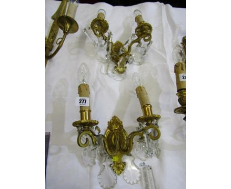 LIGHTING, pair of antique brass design twin brass wall lights with cut glass droplets, 9" height 