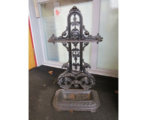 A Victorian cast iron umbrella/stick stand with man mask design, 74cm x 40cm x 20cm