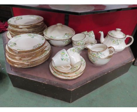 An Alfred Meakin part tea/ dinner service, pale cream ground with foliate decoration and gilt rims 