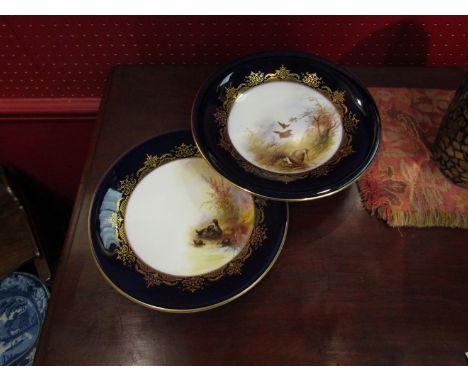 Two Royal Worcester dishes painted with woodcock and water hen including footed example