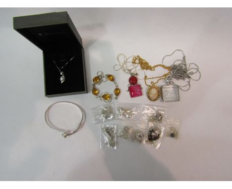A quantity of pendants on chains and a bangle stamped 925