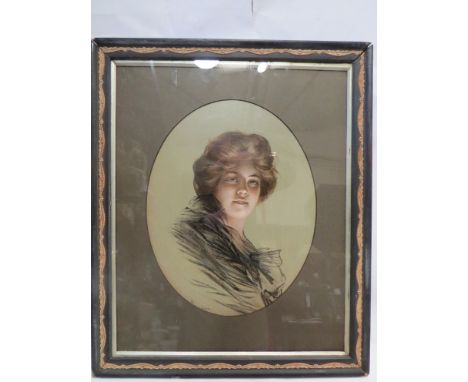 An oval mount portrait print of a lady, partially obscured signature lower left, framed and glazed, 38cm x 30cm