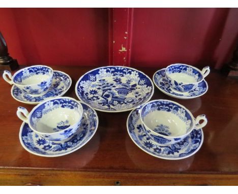 An early Victorian Hilditch &amp; Sons blue and white part tea set comprising of four cups and saucers and a dish