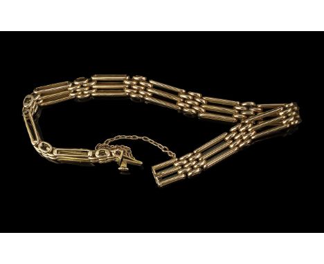 Ladies 15ct Gold 3 Bar Gate Bracelet, With Safety Chain. Hallmarked for 15ct Gold. Approx Weight 20.5 grams. Approx Length 8 