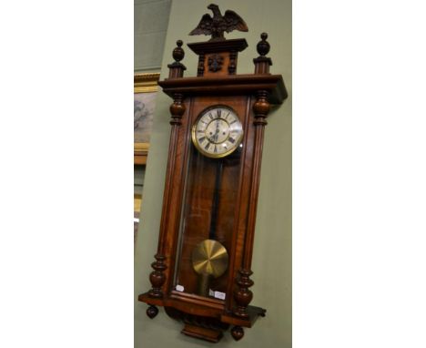 A walnut Vienna type double weight driven wall clock, dial stamped 'GB' for Gustav Becker 