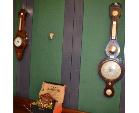 A rosewood wheel barometer, a modern cuckoo wall clock and an oak cased aneroid barometer (3)