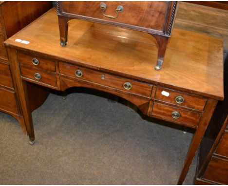 A 19th century mahogany side table containing a central long drawer and four side drawers 