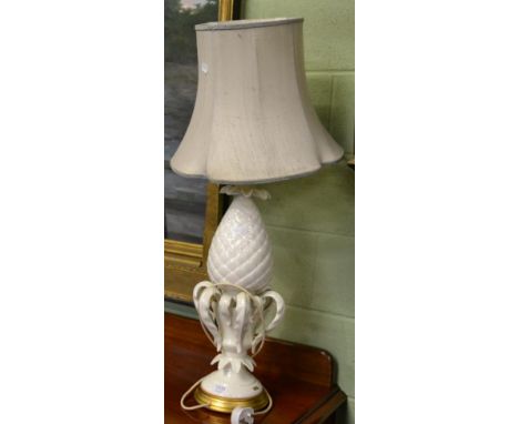 A cream glazed artichoke form table lamp