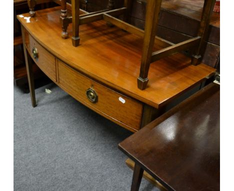 A 19th century mahogany bow fronted side table with two drawers