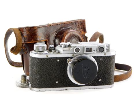 A Russian type Leica IIIa camera, serial number 357642, with a Leitz 5cm f3.5 Elmar lens, in a leather case. 