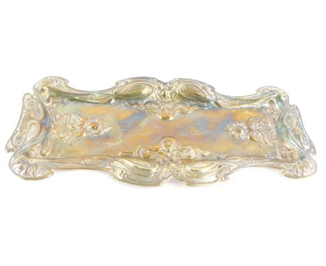 An early 20thC silver plated snuffer tray, decorated in Art Nouveau style with scrolls, flowers, etc., 25cm long.