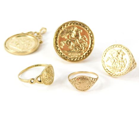 A group of sovereign type jewellery, to include mainly imitation set 9ct gold dress rings and a 9ct gold pendant tray mount, 